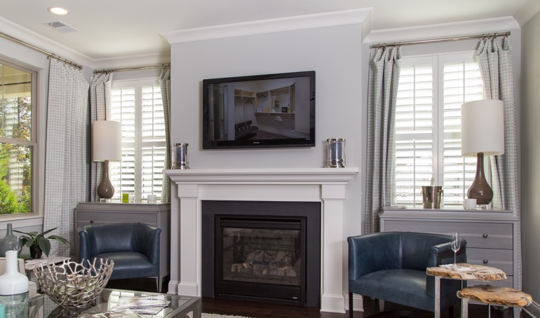 Cincinnati fireplace with plantation shutters.